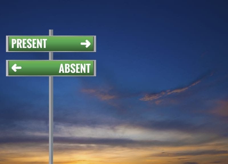 Sign post with absent and an arrow above pointing to the right